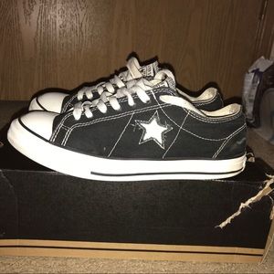 Black and white one star converses